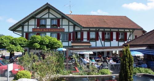 Hausernmoos Hotel | Hotel Restaurant Koi-Gartenteich