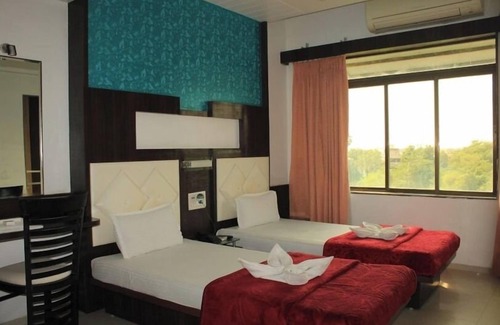 Bilimora Hotel | Hotel Saffron