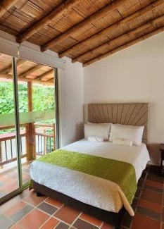 Zetaquira Hotel | Hotel y termales Las Heliconias