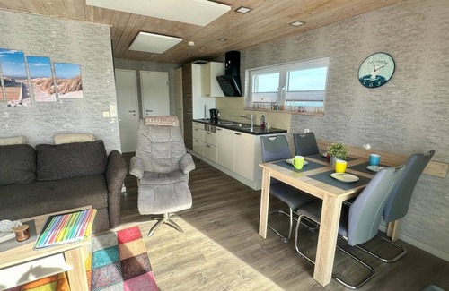 Ostholstein Boat Rental | House Boat 'Annis Mehrblick' with Sea View, Private Terrace and Wi-Fi