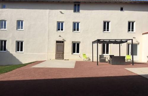 Saint-Symphorien-de-Lay House | House of character in the heart of an equestrian estate