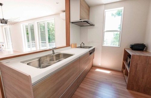 Kawazu House | House surrounded by trees with a dog run/Kamogun Shizuoka