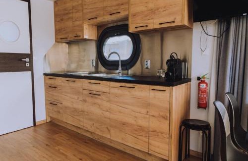 Municipality of Uitgeest Boat Rental | Houseboat at Marina with Lake Views, cleaning included