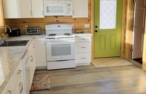 Newcastle House | Hunt Acres Grey Cottage