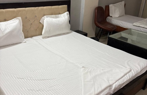Sector 49 Hotel | ICY WHITE STAY HERE