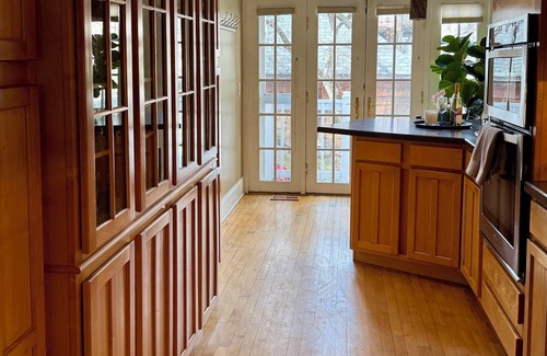 Old Town House | Ideal Group Getaway: Prime Location, Parking, Backyard, Sunroom & Pet-Friendly