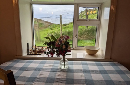 Renvyle Cottage | Idyllic Connemara cottage with sweeping sea, island and mountain views.