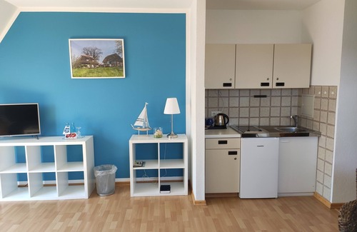 Gueby Apartment | Idyllische Ferienwohnung mit Balkon und Großer Gartenanlage