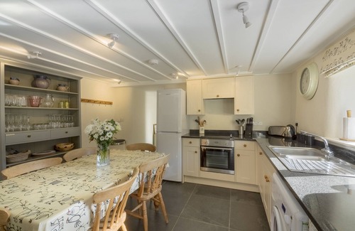 Portholland Cottage | In an exceptional position right on the beach is this spacious and comfortable cottage - a perfect g