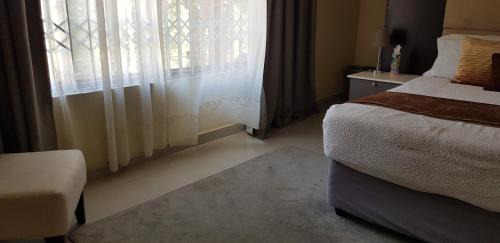 Blantyre Apartment | InstaHomes by Tru - Hillside Suite