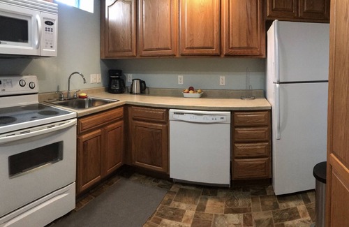 Munising Apartment | Inviting vacation apt. in town w A/C, short walk to Lk Superior, Food Trk, Pub
