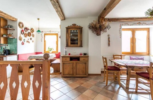 Pellizzano Cabin | iRIVAS Lodge with views of the Dolomites in a historic village dating back to the 1300s
