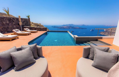 Vourvoulos Villa | Islet Santorini Retreat: Infinity Caldera Views