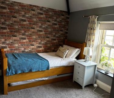 Skipsea House | Ivy House, three bed cottage, parking garden