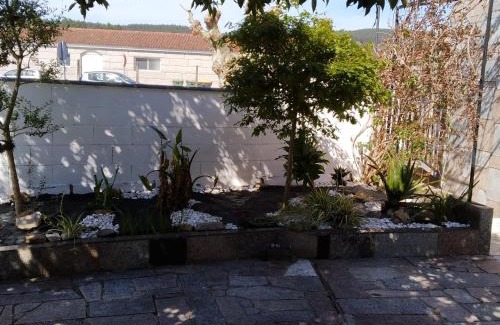 Areas Apartment | Jardín