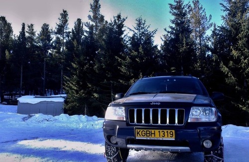 Bishkek House | Jeep with camping equipment