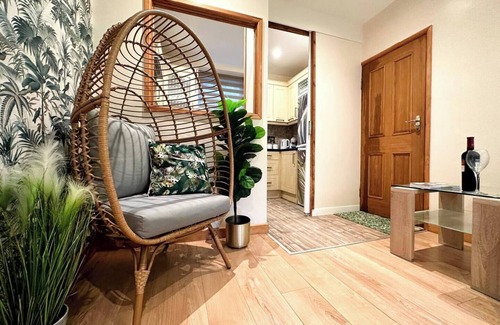 Rhondda Cynon Taff Apartment | Joyful Jungle Jewel w/Balcony & Foozeball-Ferndale