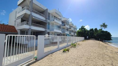Guanajibo House | Joyuda Beachfront Condo with Private Balcony