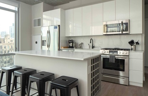 Near North Side Apartment | Kasa | Fresh & Bright 2 BD + Laptop Friendly | River North Chicago
