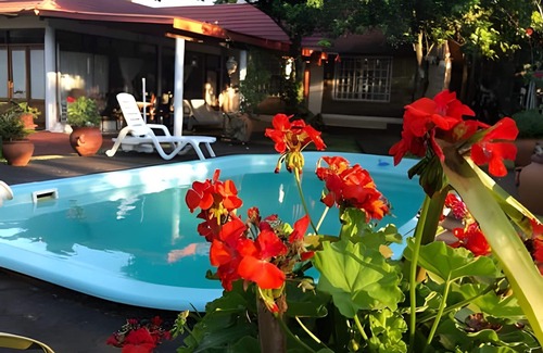 Obera Condo | KatyArte cabins with pool entering Oberá