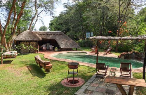 Komanyana Cabin | Kayube Estate Bungalows