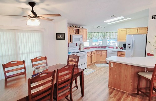 Edgewater House | Kick Back & Relax with two pools, a boat launch, community pier and more!