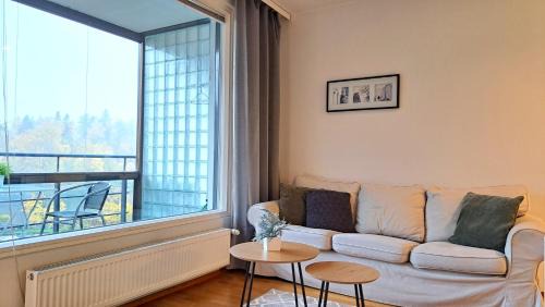 Tampere Apartment | Kotimaailma Apartments - saunallinen kaksio koskinäkymällä - Verstaankatu