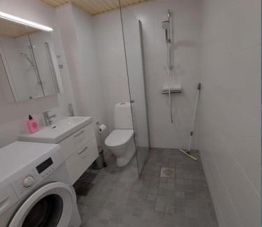 Lantinen District Apartment | Kotimaailma - Tyylikäs kaksio modernilla keittiöllä