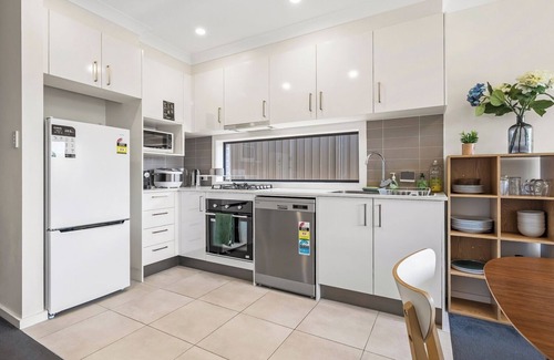 Austral House | KozyGuru | Austral | Charming 4Bedroom Family Home