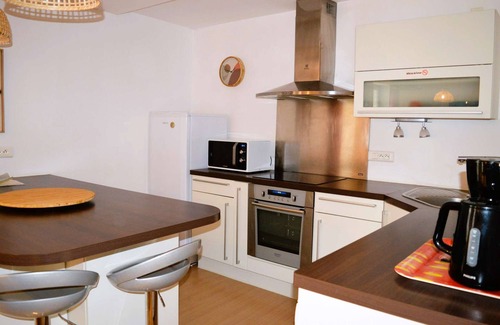 Luc-sur-Mer Apartment | L'escapade - Logement les Pieds Dans L'eau à Luc