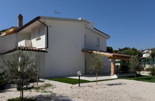 Cala Liberotto House | La Corte degli Ulivi Residenza