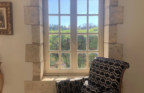 Celles Apartment | La Juliette, a cute studio in an old farmhouse on the side of a hill.