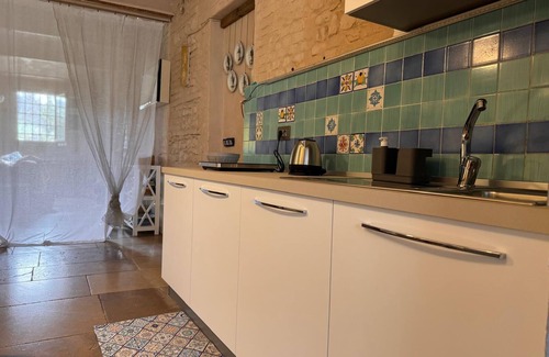 Albinea Apartment | La Maison Deux, an old farmhouse from the late 18th century, with Provençal features.