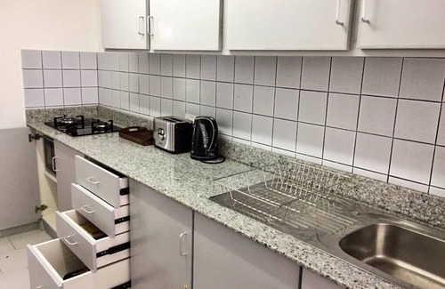 Forest Side Apartment | La Péninsule - Town Apartment in Curepipe 1