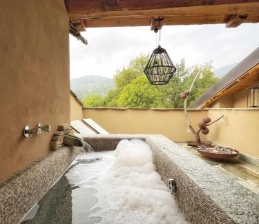 Rossana Apartment | La Terrazza Naturas con romantica mini piscina calda sui tetti
