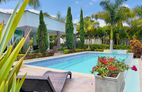 Calima Villa | Lago Calima Bliss: Secret Garden Paradise in Darien