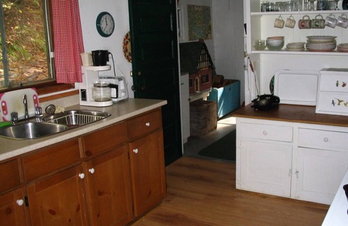 Lake of Bays Cottage | Lake of Bays - patio and deck at waters edge, sun all day from 11:00 AM.