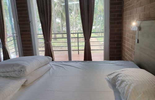 Heggadadevankote Resort | Lake side retreat with earthen cottages