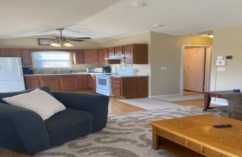 Jacksboro Cottage | Lakefront Cabin in quiet cove. No steps to private boat slip. Pet friendly.