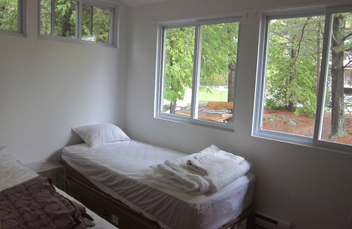 Frontenac House | Lakefront Cottage: Hot Tub, Dock, & Amenities: Boats, Kayaks, SUP, Bikes, Bball
