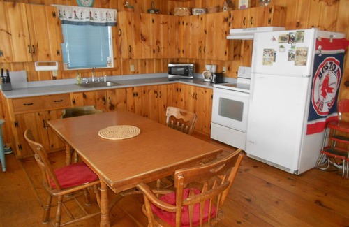 The Bays Cottage | Lakefront Cottage with 100' Sandy Beach, Dock, Views and Game Room.