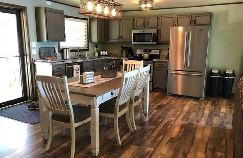 Crivitz Cottage | Lakefront cottage with beautiful sunset view - Private dock and beach area