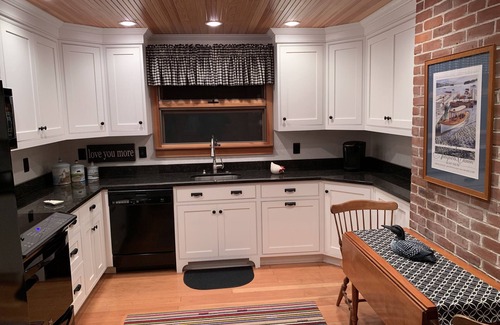 Laconia Cottage | Lakefront Cottage with Lighthouse and Dock on Lake Winnipesaukee