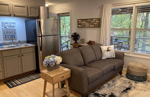 Jamestown Cabin | Lakefront, Gas Firepit. Hot Tub. Private Dock. Pup Friendly