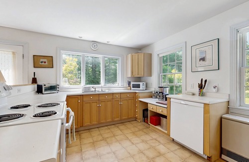Union House | Lakefront home with large yard, screened porch & amazing views