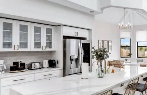 Rowlett Villa | Lakefront Luxe 6BR/4.5B Home with Pool & Hot Tub