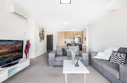 Merrimac Apartment | Lakeside Family Oasis with Pool, Gym and Balcony