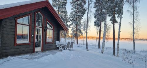 Falun House | Lakeside log cabin Främby Udde Falun