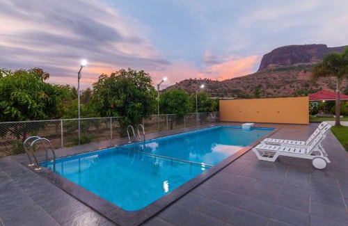 Khodala Villa | Lakeside Summers by StayVista - Mountain and Waterfalls view, Terrace, Pool & Snooker table for a perfect getaway