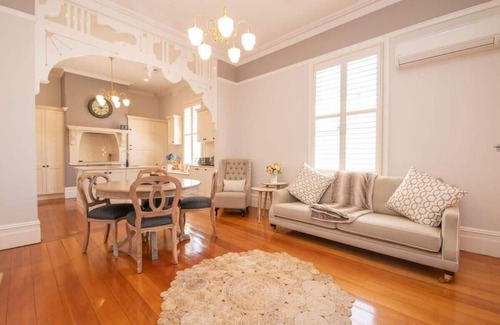 Orange House | Lansdowne - Grand Byng St Heritage Home in CBD